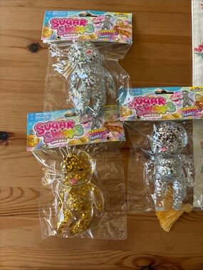 3 bundle Sugar Swaps Onesies Glitter Squishies - Silver & Gold